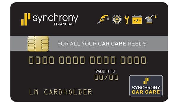 A Synchrony Financial car care credit card with a gold chip.